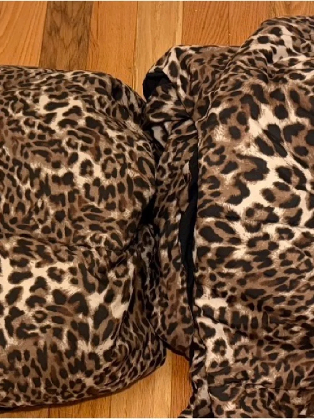 Leopard Print twin bedspread 2 of them come with this bundle and a Brown case